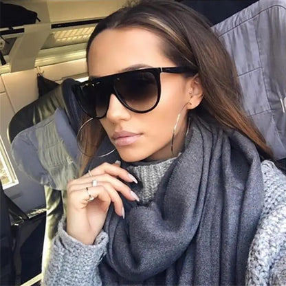 Experience ultimate style and protection with our Flat Top Oversized Women Sunglasses, big frame and UV400 protection offer both fashion and function