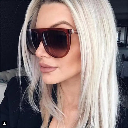 Experience ultimate style and protection with our Flat Top Oversized Women Sunglasses, big frame and UV400 protection offer both fashion and function